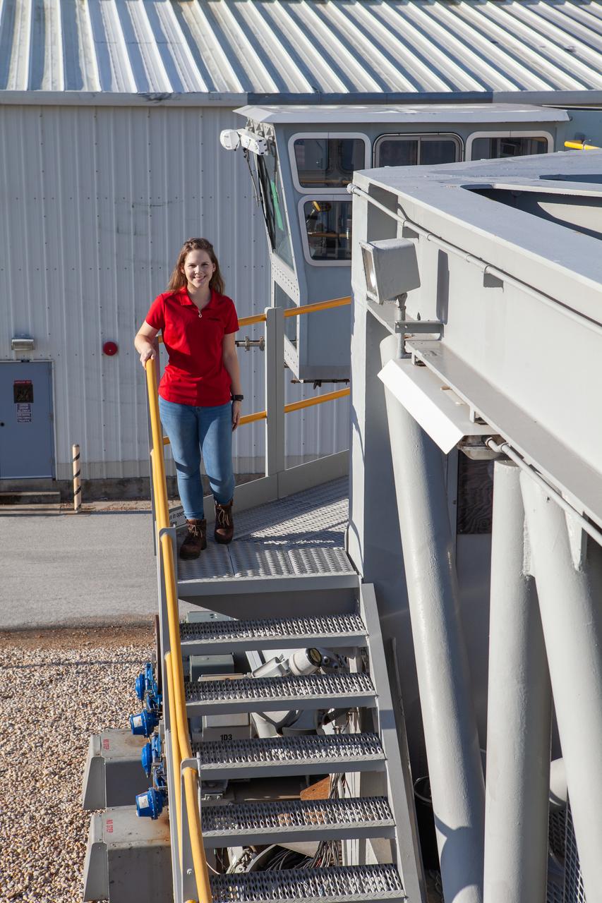 Mechanical Engineer I Breanne Stichler is photographed atop NASA’s Crawler-Transporter 2 (CT-2) at the Kennedy Space Center in Florida on Aug. 8, 2019. Stichler started working at Kennedy in June and is among one of the few females to have ever driven the crawler. CT-2 will carry the agency’s mobile launcher with the Space Launch System rocket from the Vehicle Assembly Building to Launch Pad 39B for the launch of Artemis 1, the first in a series of complex missions that will provide the foundation for human deep space exploration. 