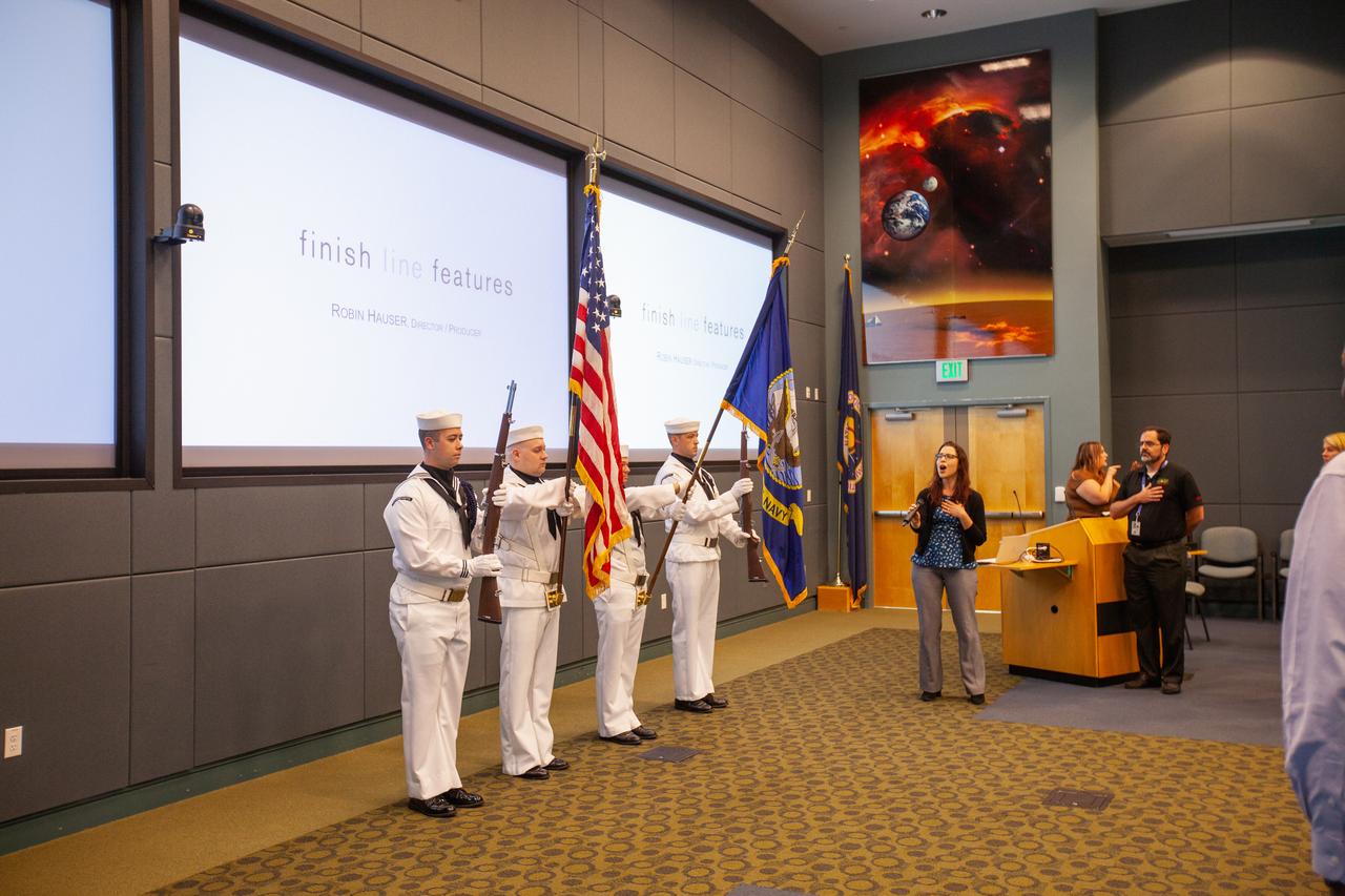 Ivette Aponte, from Kennedy Space Center’s Engineering Directorate, sings the National Anthem at the “KSC and Proud to Be” centerwide diversity event held at the Florida spaceport’s Operations Support Building II (OSB II) on Aug. 20, 2019. The event featured a presentation by Robin Hauser, a director and producer of award-winning documentaries. Hauser, who has spoken at the White House and at conferences worldwide, addressed bias in artificial intelligence. A new employee video focusing on the importance of employee resource groups at the center made its debut showing at the event.