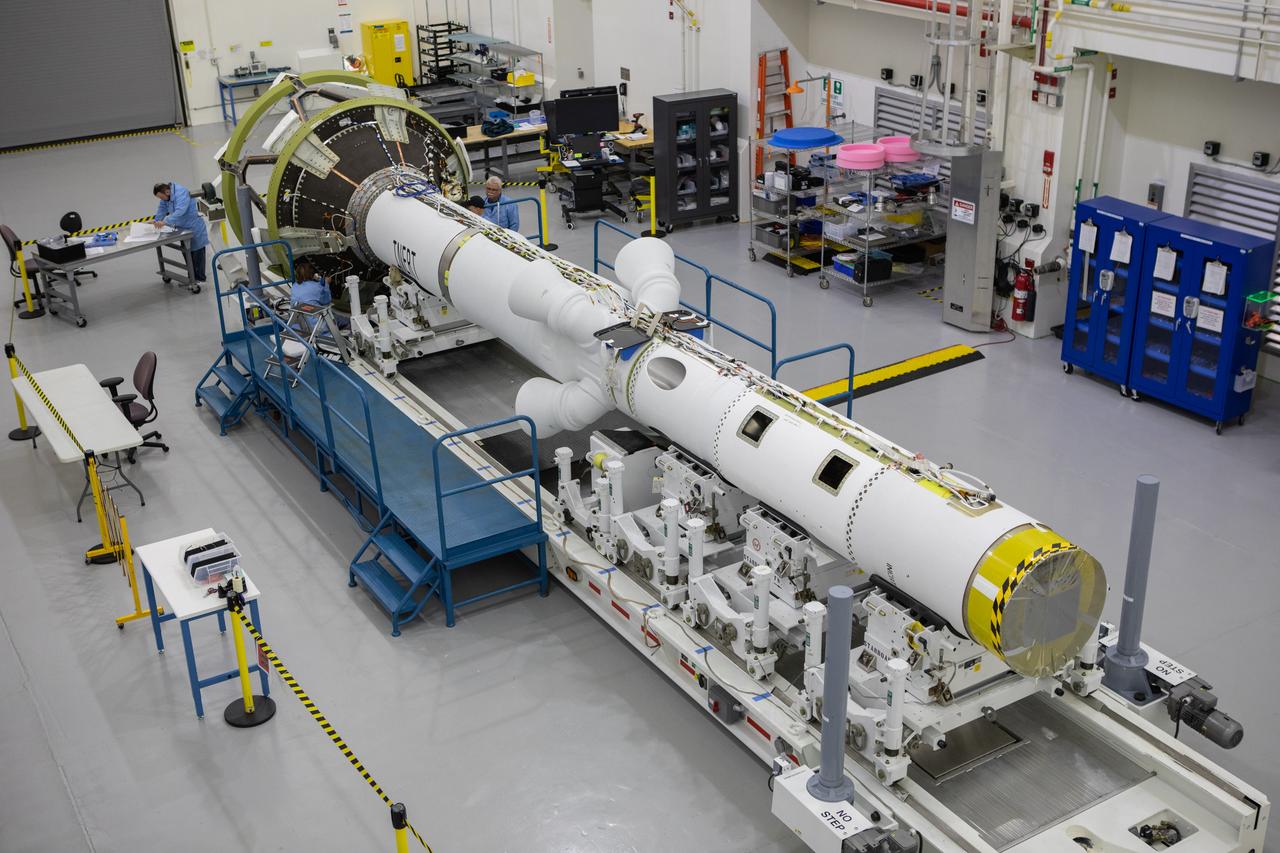 In this view from above inside the Launch Abort System Facility at NASA’s Kennedy Space Center in Florida, work is underway Aug. 21, 2019, to integrate segments of the launch abort system for the agency’s uncrewed flight test, Artemis I. During crewed launches of the Orion spacecraft atop the Space Launch System rocket, the LAS will protect the crew module and astronauts aboard to safety if an emergency occurs during launch.