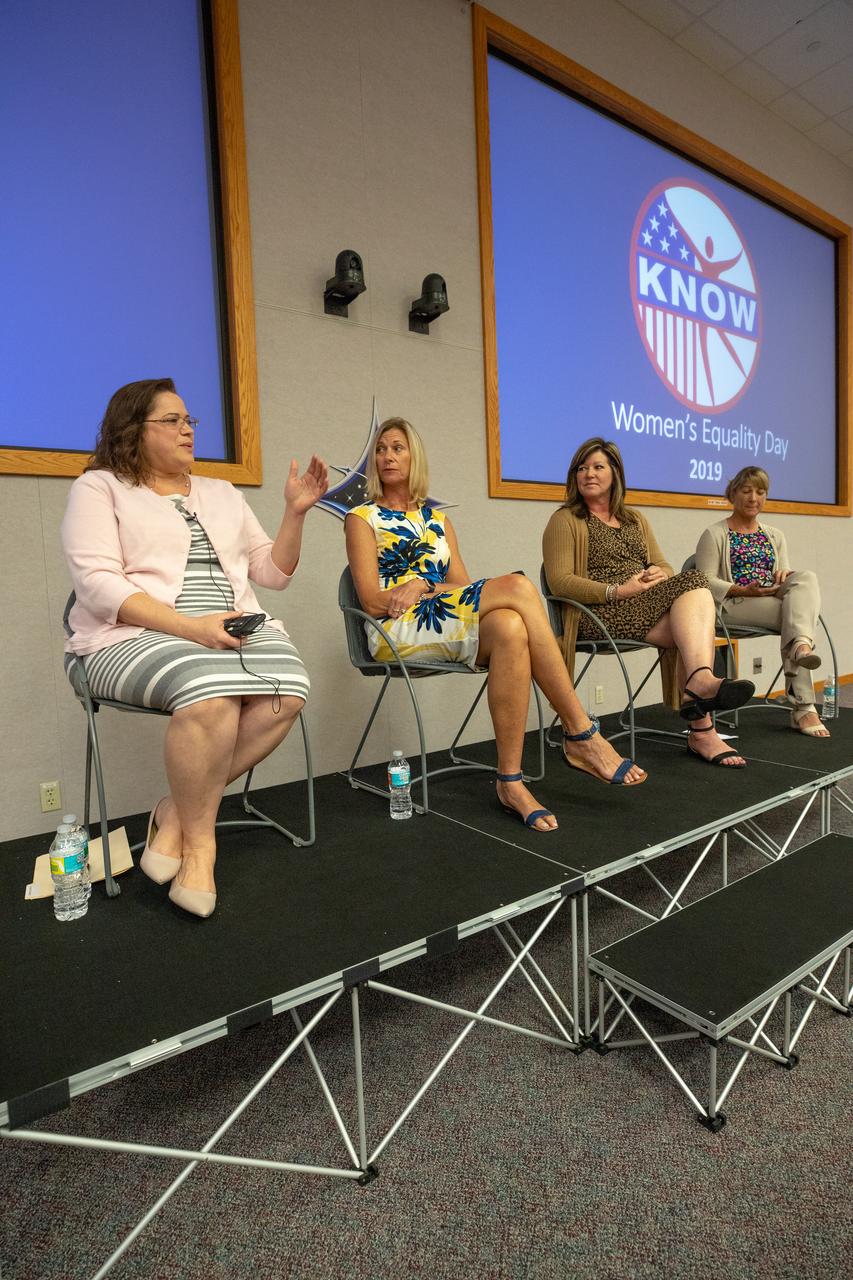 A panel discussion, featuring women in leadership roles at NASA’s Kennedy Space Center in Florida, is held on Aug. 26, 2019, to celebrate Women’s Equality Day. The event, sponsored by the Kennedy Networking Opportunities for Women (KNOW) employee resource group, honored the 100th anniversary of the passing of the 19th amendment guaranteeing all American women the right to vote. Seated from left, are Digna Carballosa, director of the Human Resources Office; Nancy Bray, director of Spaceport Integration and Services; Jennifer Kunz, director of Safety and Mission Assurance; and Amanda Mitskevich, Launch Services Program manager. The purpose of KNOW is to provide focus on issues such as employment, retention, promotion, training, career and personal development, education, and identify and eliminate barriers that hinder the advancement of women in the workforce.