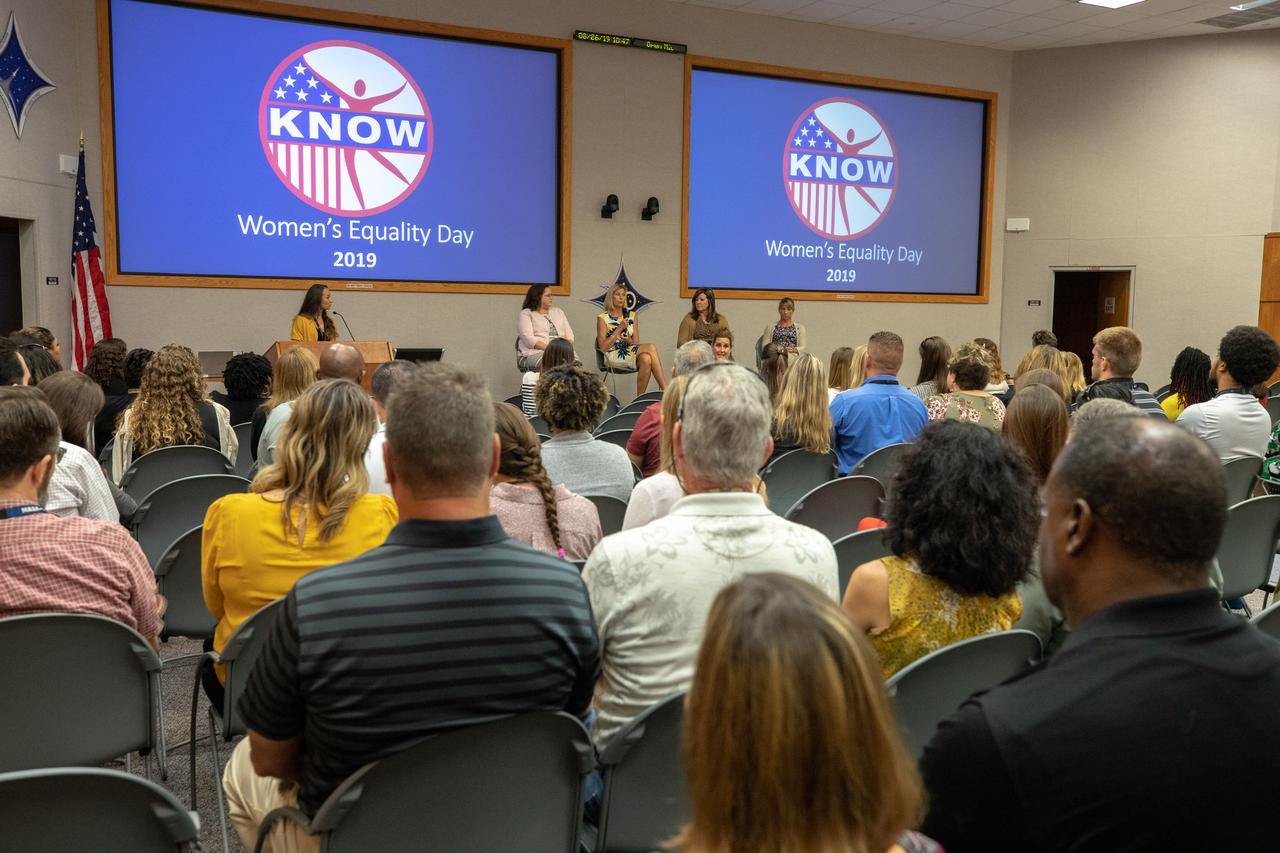 A panel discussion, featuring women in leadership roles at NASA’s Kennedy Space Center in Florida, is held on Aug. 26, 2019, to celebrate Women’s Equality Day. The event, sponsored by the Kennedy Networking Opportunities for Women (KNOW) employee resource group, honored the 100th anniversary of the passing of the 19th amendment guaranteeing all American women the right to vote. Seated in front from left, are Digna Carballosa, director of the Human Resources Office; Nancy Bray, director of Spaceport Integration and Services; Jennifer Kunz, director of Safety and Mission Assurance; and Amanda Mitskevich, Launch Services Program manager. At far left is Ashley Nelsen, Launch Service Program information manager and panel discussion moderator. The purpose of KNOW is to provide focus on issues such as employment, retention, promotion, training, career and personal development, education, and identify and eliminate barriers that hinder the advancement of women in the workforce. 