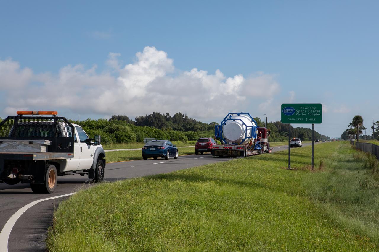 The cargo logistics module for Sierra Nevada Corporation’s Dream Chaser, the company’s reusable spaceplane, arrives at NASA’s Kennedy Space Center in Florida on Aug. 27, 2019. The cargo module – secured atop a truck – is being taken to Kennedy’s Space Station Processing Facility. A 15-foot attachment to Dream Chaser, the cargo module provides extra storage for payloads and provides cargo disposal upon re-entry into Earth’s atmosphere. Dream Chaser will deliver more than 12,000 pounds of cargo to the International Space Station under NASA’s Commercial Resupply Services 2 contract. The spacecraft and cargo module will begin resupply and return services missions to the space station in late 2021. 