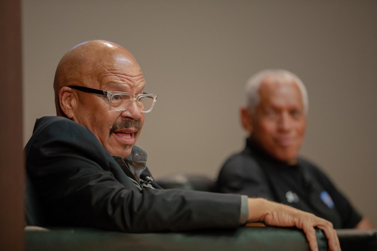 National radio host Tom Joyner hosts a panel discussion at NASA’s Kennedy Space Center in Florida on Aug. 28, 2019, about the agency’s Moon to Mars plans. The discussion was open for all Kennedy employees to attend. In the background, panel participant and former NASA administrator Charlie Bolden can be seen. Additional participants included Kennedy Chief Technologist Barbara Brown and Exploration Ground Systems Associate Manager, Technical, Kim Carter.