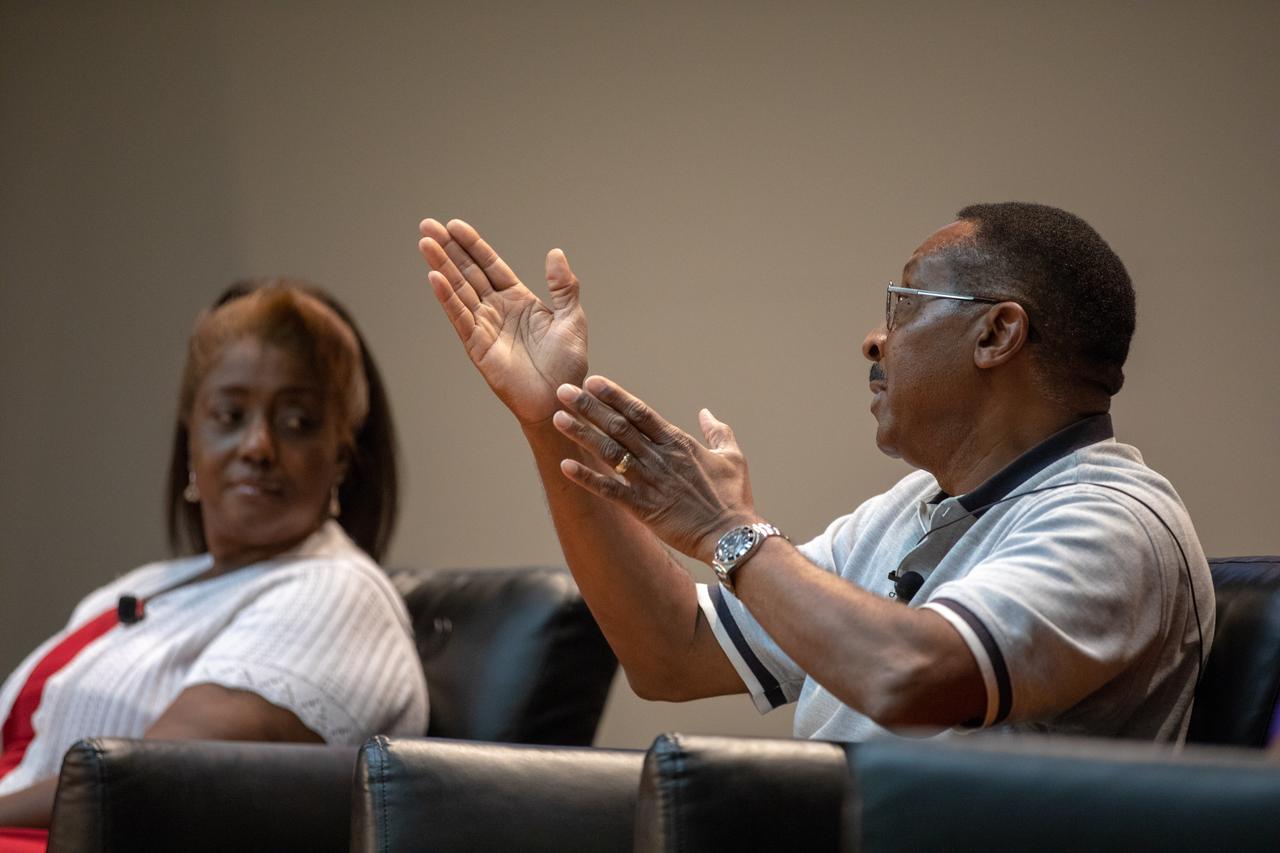 Former NASA astronaut Winston Scott, right, participates in a panel discussion on Aug. 28, 2019, focusing on the agency’s Moon to Mars plans. Hosted at Kennedy Space Center in Florida by national radio host Tom Joyner, the discussion was open for all Kennedy employees to attend. In the background, panel participant and Kennedy Chief Technologist Barbara Brown can be seen. Additional participants included former NASA administrator Charlie Bolden and Exploration Ground Systems Associate Manager, Technical, Kim Carter. 