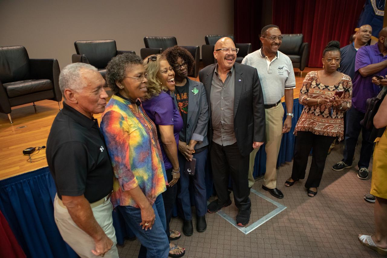 Following a panel discussion at the Kennedy Space Center on Aug. 28, 2019, Kennedy employees pose for a photo with former NASA administrator and panel participant Charlie Bolden, national radio host and panel host Tom Joyner, co-host Sybil Wilkes and former astronaut Winston Scott. The discussion focused on the agency’s Moon to Mars plans and was open for all Kennedy employees to attend. Additional panel participants included Kennedy Chief Technologist Barbara Brown and Exploration Ground Systems Associate Manager, Technical, Kim Carter.