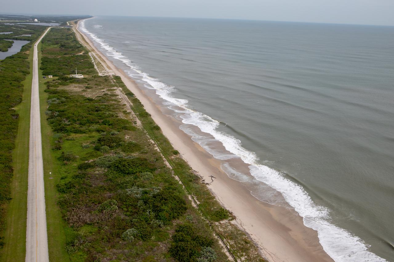 An aerial survey of NASA's Kennedy Space Center in Florida was conducted after Hurricane Dorian skirted the Space Coast area. The survey was performed to identify structures and facilities that may have sustained damage from Hurricane Dorian as the storm passed to the east of Kennedy on September 3 and 4, 2019. Officials determined that the center received some isolated damage and limited water intrusion. Beach erosion also occurred, although the storm surge was less than expected. NASA closed the center ahead of the storm’s onset and only a small team of specialists known as the Rideout Team was on the center as the storm approached and passed.