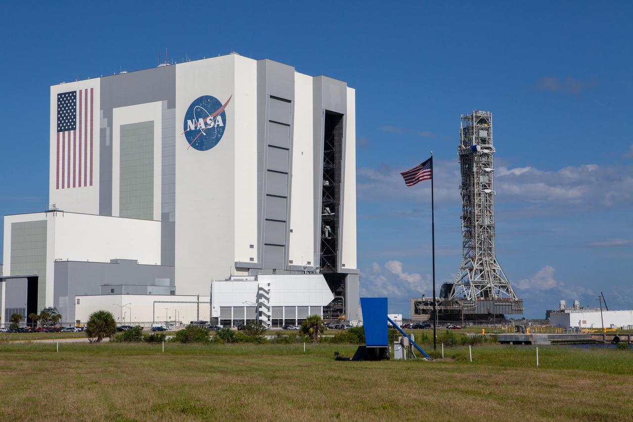 The mobile launcher for NASA’s Artemis missions rolls out of the Vehicle Assembly Building (VAB) at Kennedy Space Center in Florida on Sept. 10, 2019, after spending a week and a half inside due to the approach of Hurricane Dorian. The nearly 400-foot-tall structure was moved from Launch Pad 39B to the VAB for safekeeping on Aug. 30. The storm passed about 70 miles east of the spaceport during the overnight hours Tuesday, Sept. 3, and Wednesday, Sept. 4. NASA’s Exploration Ground Systems is moving the mobile launcher back to the launch pad, where teams will complete testing and checkout on the launcher in the coming weeks for the Artemis I mission.