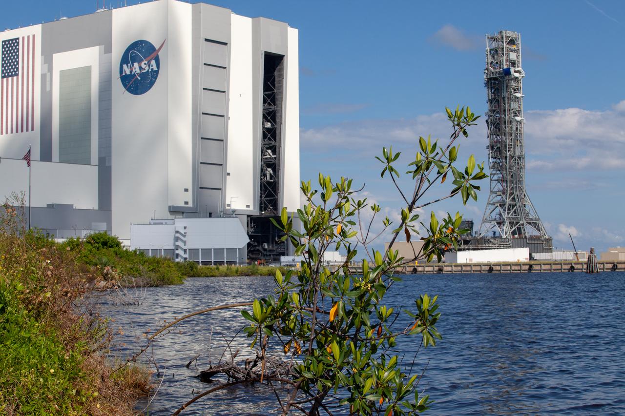 The mobile launcher for NASA’s Artemis missions rolls out of the Vehicle Assembly Building (VAB) at Kennedy Space Center in Florida on Sept. 10, 2019, after spending a week and a half inside due to the approach of Hurricane Dorian. The nearly 400-foot-tall structure was moved from Launch Pad 39B to the VAB for safekeeping on Aug. 30. The storm passed about 70 miles east of the spaceport during the overnight hours Tuesday, Sept. 3, and Wednesday, Sept. 4. NASA’s Exploration Ground Systems is moving the mobile launcher back to the launch pad, where teams will complete testing and checkout on the launcher in the coming weeks for the Artemis I mission.