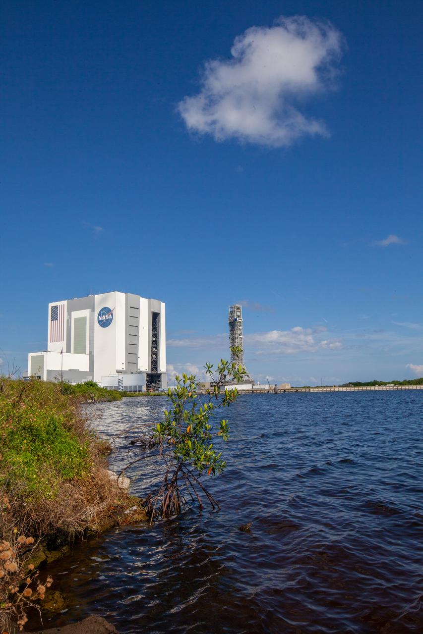 The mobile launcher for NASA’s Artemis missions rolls out of the Vehicle Assembly Building (VAB) at Kennedy Space Center in Florida on Sept. 10, 2019, after spending a week and a half inside due to the approach of Hurricane Dorian. The nearly 400-foot-tall structure was moved from Launch Pad 39B to the VAB for safekeeping on Aug. 30. The storm passed about 70 miles east of the spaceport during the overnight hours Tuesday, Sept. 3, and Wednesday, Sept. 4. NASA’s Exploration Ground Systems is moving the mobile launcher back to the launch pad, where teams will complete testing and checkout on the launcher in the coming weeks for the Artemis I mission.