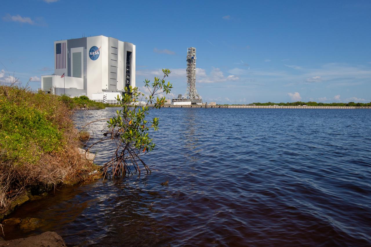 The mobile launcher for NASA’s Artemis missions rolls out of the Vehicle Assembly Building (VAB) at Kennedy Space Center in Florida on Sept. 10, 2019, after spending a week and a half inside due to the approach of Hurricane Dorian. The nearly 400-foot-tall structure was moved from Launch Pad 39B to the VAB for safekeeping on Aug. 30. The storm passed about 70 miles east of the spaceport during the overnight hours Tuesday, Sept. 3, and Wednesday, Sept. 4. NASA’s Exploration Ground Systems is moving the mobile launcher back to the launch pad, where teams will complete testing and checkout on the launcher in the coming weeks for the Artemis I mission.