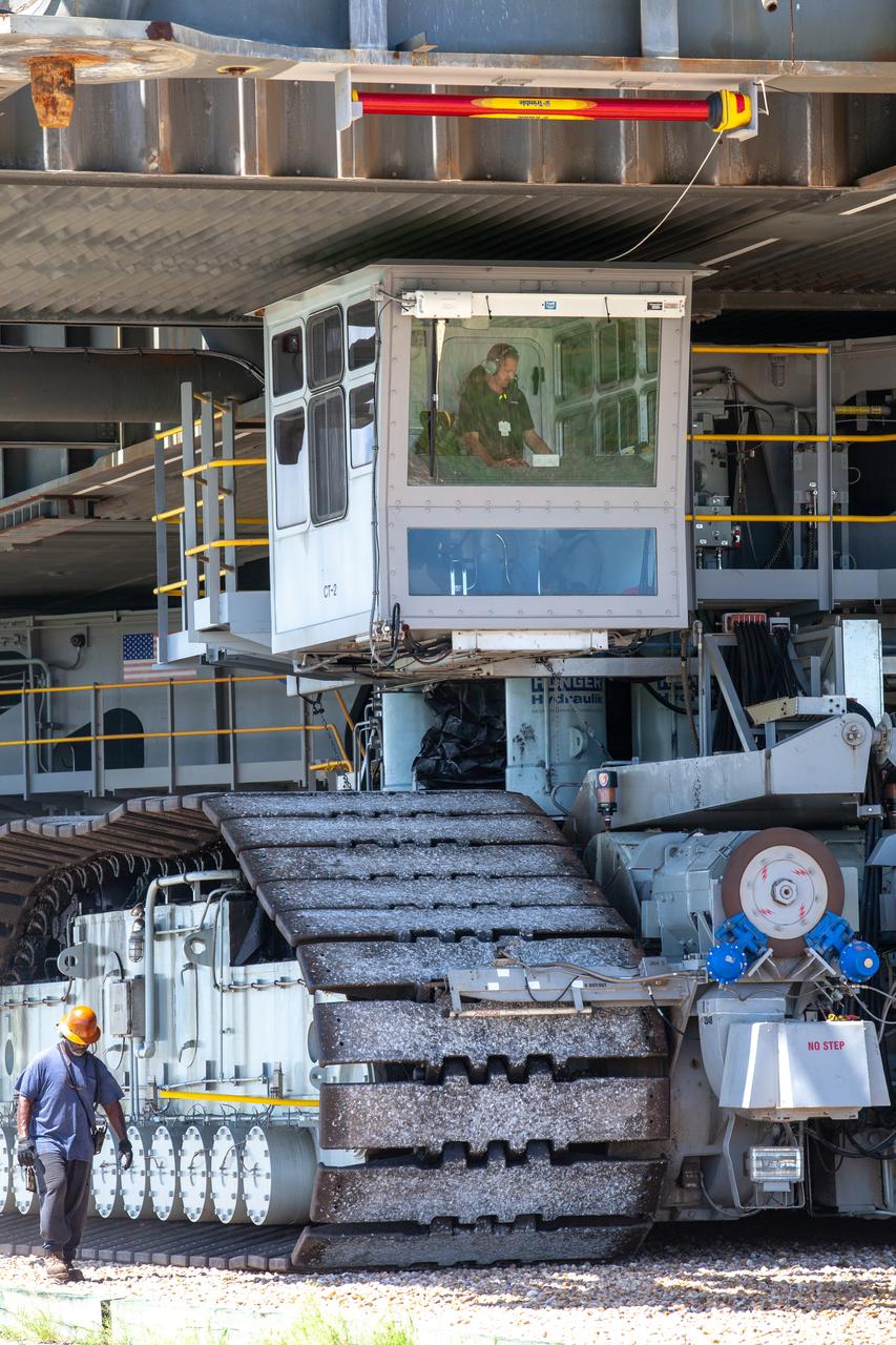 NASA’s mobile launcher (ML) atop crawler-transporter 2 moves along the crawlerway on Sept. 10, 2019, after spending a week and a half inside the Vehicle Assembly Building (VAB) at Kennedy Space Center in Florida due to the approach of Hurricane Dorian. The nearly 400-foot-tall structure was moved from Launch Pad 39B to the VAB for safekeeping on Aug. 30. The storm passed about 70 miles east of the spaceport during the overnight hours Tuesday, Sept. 3, and Wednesday, Sept. 4. NASA’s Exploration Ground Systems is moving the mobile launcher back to the launch pad, where teams will complete testing and checkout on the launcher in the coming weeks for the Artemis I mission.
