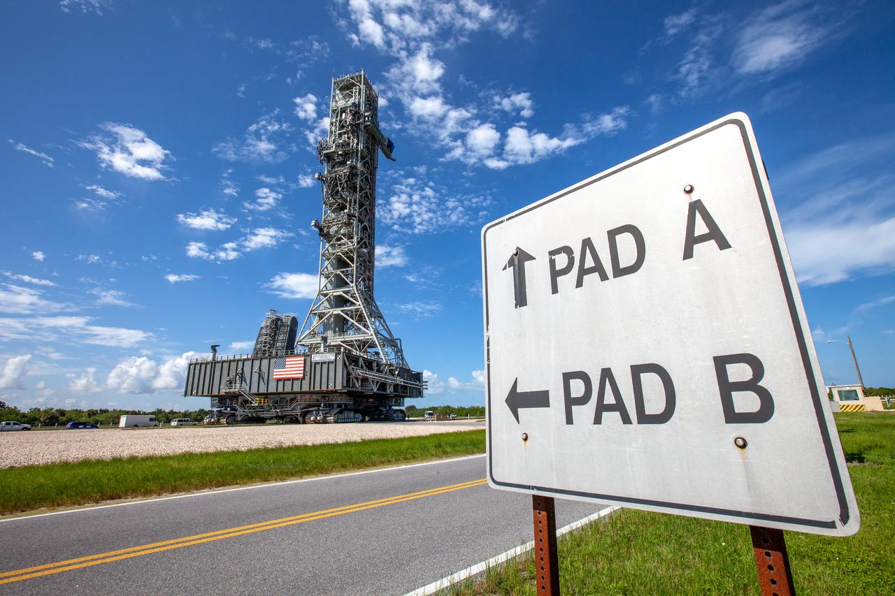 NASA’s mobile launcher (ML) atop crawler-transporter 2 moves along the crawlerway and nears the turn to Launch Pad 39B on Sept. 10, 2019, after spending a week and a half inside the Vehicle Assembly Building (VAB) at Kennedy Space Center in Florida due to the approach of Hurricane Dorian. The nearly 400-foot-tall structure was moved from Pad B to the VAB for safekeeping on Aug. 30. The storm passed about 70 miles east of the spaceport during the overnight hours Tuesday, Sept. 3, and Wednesday, Sept. 4. NASA’s Exploration Ground Systems is moving the mobile launcher back to the launch pad, where teams will complete testing and checkout on the launcher in the coming weeks for the Artemis I mission.