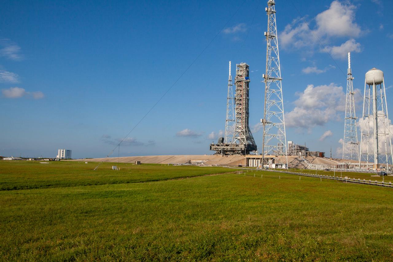 The mobile launcher for Artemis missions is at Launch Pad 39B on Sept. 11, 2019, at NASA’s Kennedy Space Center in Florida, after spending a week and a half inside the Vehicle Assembly Building (VAB) due to the approach of Hurricane Dorian. The nearly 400-foot-tall structure was moved from Launch Pad 39B to the VAB for safekeeping on Aug. 30. The storm passed about 70 miles east of the spaceport during the overnight hours Tuesday, Sept. 3, and Wednesday, Sept. 4. NASA’s Exploration Ground Systems is moved the mobile launcher back to the launch pad, where teams will complete testing and checkout on the launcher in the coming weeks for the Artemis I mission.