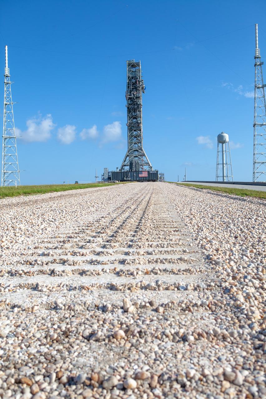 The mobile launcher for Artemis missions is at Launch Pad 39B on Sept. 11, 2019, at NASA’s Kennedy Space Center in Florida, after spending a week and a half inside the Vehicle Assembly Building (VAB) due to the approach of Hurricane Dorian. The nearly 400-foot-tall structure was moved from Launch Pad 39B to the VAB for safekeeping on Aug. 30. The storm passed about 70 miles east of the spaceport during the overnight hours Tuesday, Sept. 3, and Wednesday, Sept. 4. NASA’s Exploration Ground Systems is moving the mobile launcher back to the launch pad, where teams will complete testing and checkout on the launcher in the coming weeks for the Artemis I mission.