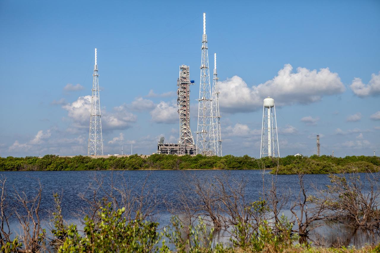 The mobile launcher for Artemis missions is at Launch Pad 39B at NASA’s Kennedy Space Center in Florida on Sept. 11, 2019, after spending a week and a half inside the Vehicle Assembly Building (VAB) due to the approach of Hurricane Dorian. The nearly 400-foot-tall structure was moved from Launch Pad 39B to the VAB for safekeeping on Aug. 30. The storm passed about 70 miles east of the spaceport during the overnight hours Tuesday, Sept. 3, and Wednesday, Sept. 4. NASA’s Exploration Ground Systems moved the mobile launcher back to the launch pad, where teams will complete testing and checkout on the launcher in the coming weeks for the Artemis I mission.