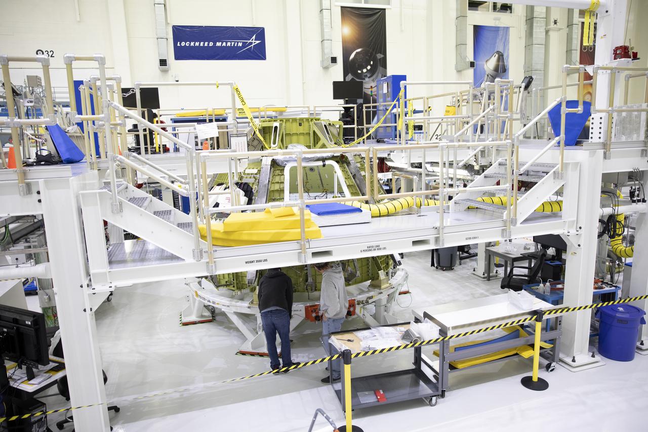 The Orion pressure vessel for NASA’s Artemis ll mission is in a processing stand inside the Neil Armstrong Operations and Checkout Building high bay on Sept. 17, 2019. Orion is being prepared for the first crewed test flight atop the agency’s Space Launch System rocket. Artemis ll will lift off from Launch Complex 39B. The mission will confirm all of the spacecraft’s systems operate as designed in the actual environment of deep space with astronauts aboard.