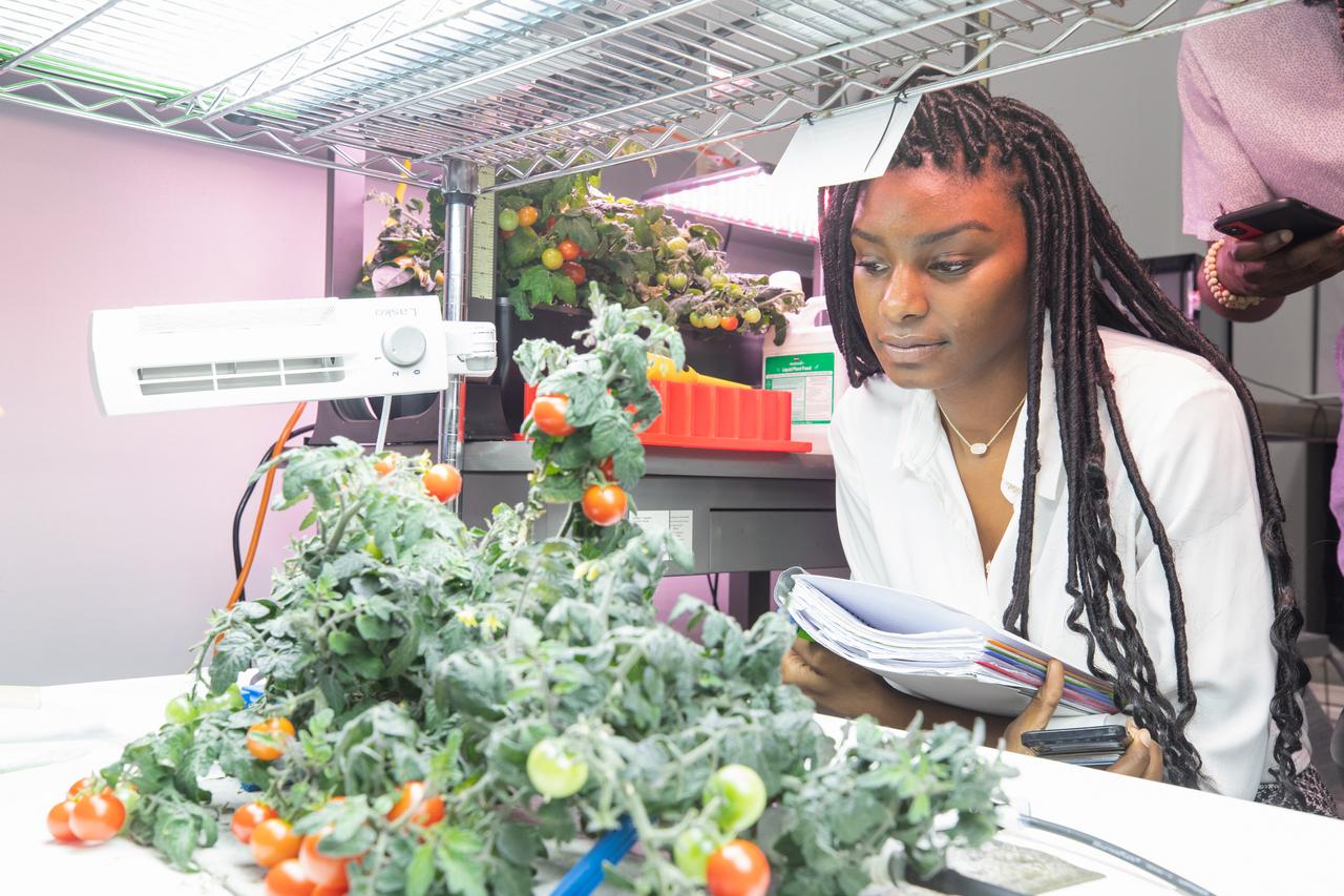 Courtney Miller, a student at Langston University in Oklahoma, participates in a hands-on experience inside a Space Station Processing Facility lab at Kennedy Space Center on Sept. 18, 2019. Miller was part of a tour of the Florida spaceport organized by NASA’s Office of Education and Langston professor Byron Quinn, Ph.D. The Kennedy visit included stops at SwampWorks, the Neil Armstrong Operations and Checkout Building, the Vehicle Assembly Building, the visitor complex and the Center for Space Education.