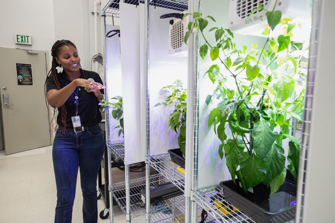 Kennedy Space Center Research and Development Scientist Lashelle Spencer discusses plant growth in space with Langston University students and professor Byron Quinn, Ph.D., inside a Space Station Processing Facility lab at Kennedy Space Center on Sept. 18, 2019. Quinn organized the tour through NASA’s Office of Education. The visit included stops at SwampWorks, the Neil Armstrong Operations and Checkout Building, the Vehicle Assembly Building, the visitor complex and the Center for Space Education.