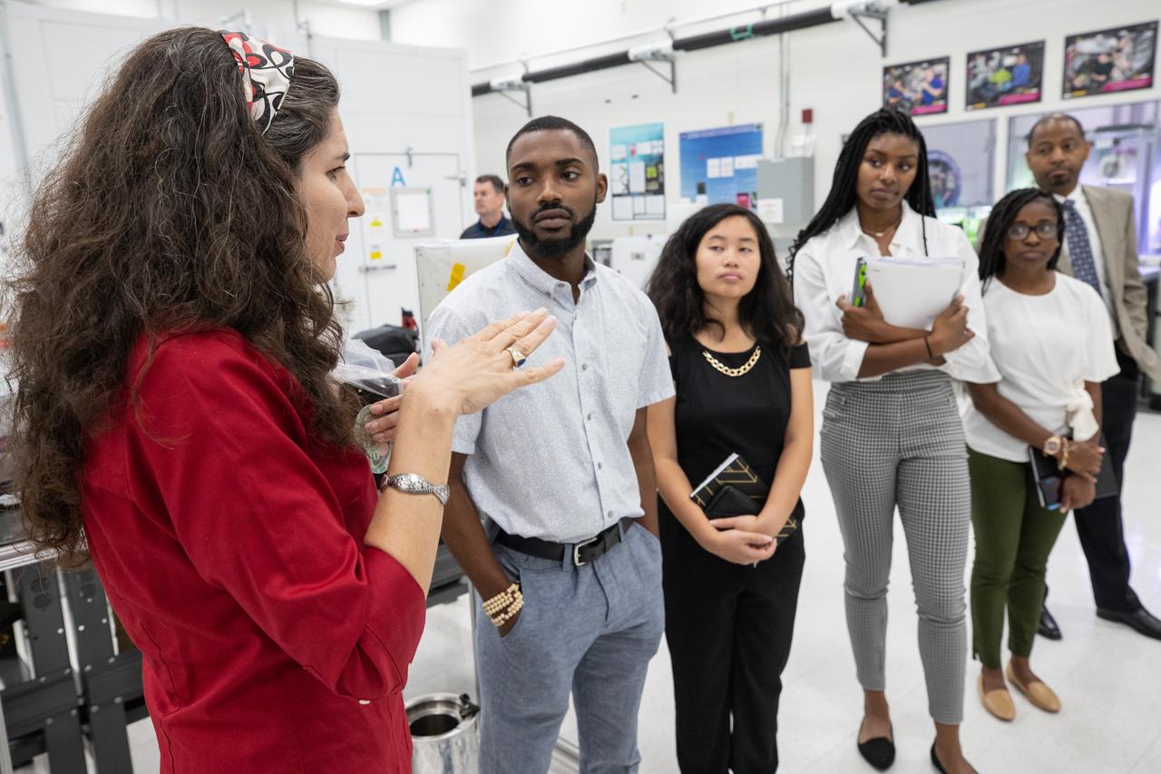 Dr. Gioia Massa, NASA Veggie project lead, addresses Langston University students, from left, Sherman Cravens, Kashia Cha, Courtney Miller and Makyah Farris, along with Langston professor Byron Quinn, Ph.D., inside a Space Station Processing Facility lab at Kennedy Space Center on Sept. 18, 2019. The tour, which was organized by Quinn and NASA’s Office of Education, included stops at SwampWorks, the Neil Armstrong Operations and Checkout Building, the Vehicle Assembly Building, the visitor complex and the Center for Space Education.