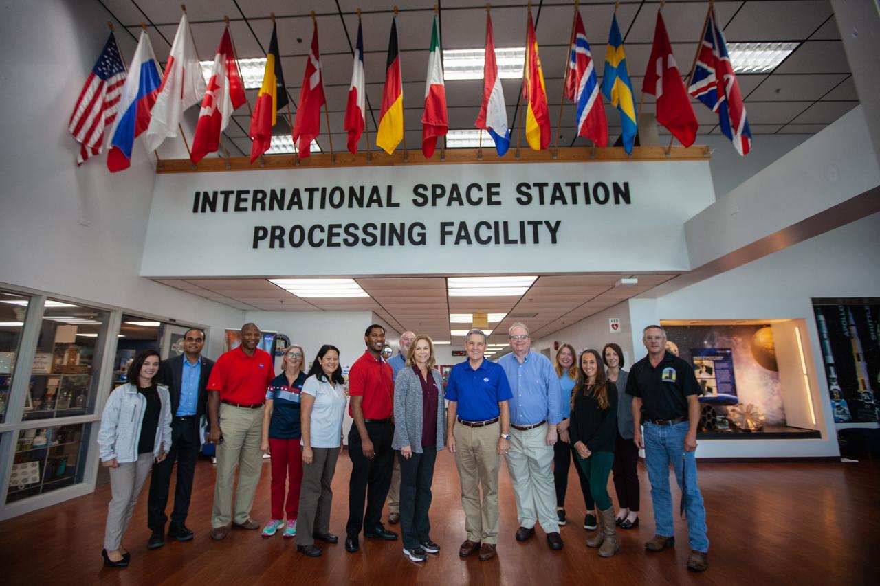 A mockup of the cargo logistics module for Sierra Nevada Corporation’s Dream Chaser, the company’s reusable spaceplane, arrived at the Space Station Processing Facility (SSPF) at NASA’s Kennedy Space Center in Florida in August. On Sept. 20, 2019, senior leadership had the opportunity to view the cargo module in the SSPF high bay. Third from left is Kelvin Manning, Kennedy associate director, technical; fifth from left is Josie Burnett, director of Exploration Research and Technology Programs. In the center are Kennedy Deputy Director Janet Petro and Kennedy Center Director Bob Cabana. Behind Petro is Ronnie Lawson, deputy director of Exploration Research and Technology Programs. To Cabana’s right is Burt Summerfield, associate director, management. At far right is James Wood, chief engineer for the Launch Services Program with the Engineering Directorate. The SSPF is providing support for current and future NASA and commercial provider programs, including Commercial Resupply Services, Artemis 1, sending the first woman and next man to the Moon, and deep space destinations including Mars.