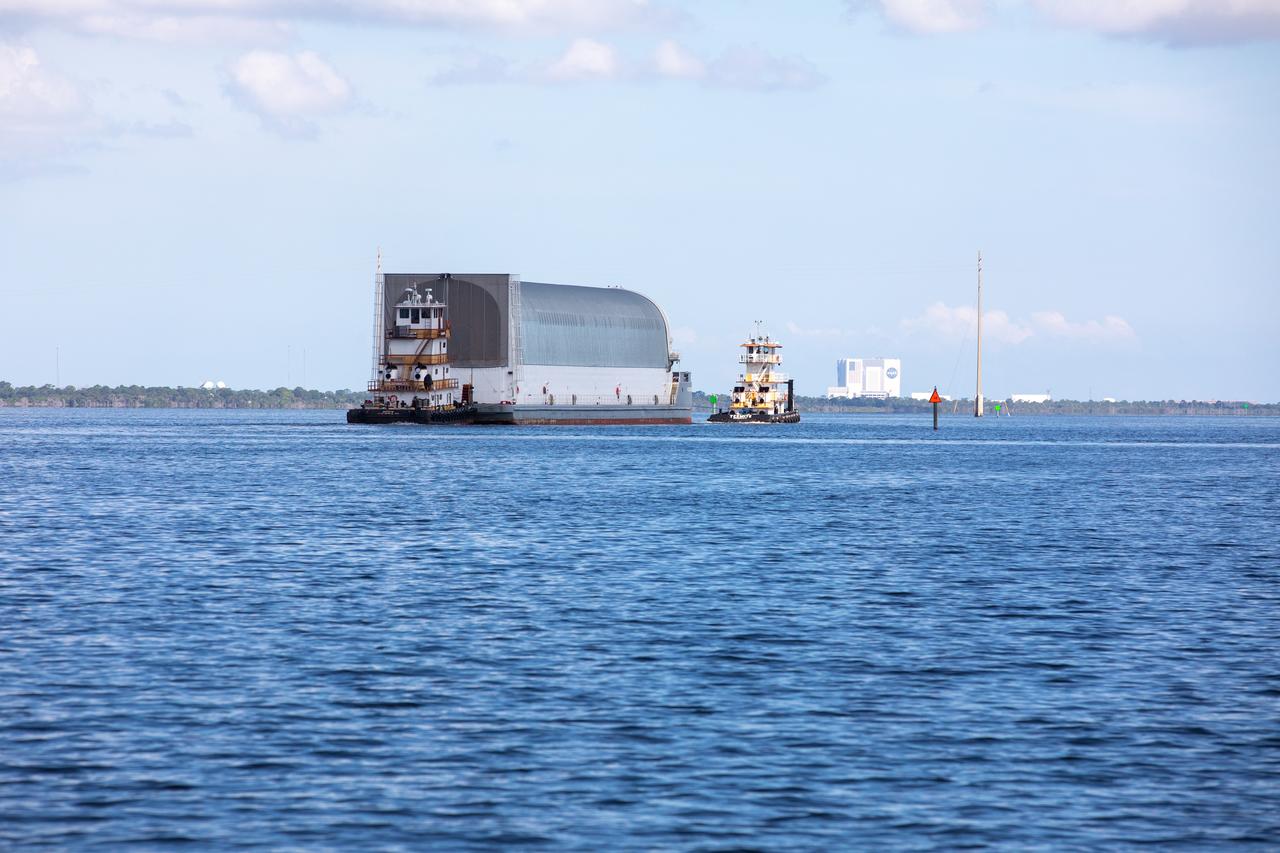 NASA's Pegasus Barge makes its way along the intercoastal waterway to its destination at the Kennedy Space Center Launch Complex 39 turn basin wharf, to make its first delivery to Kennedy in support of the agency's Artemis missions. The upgraded 310-foot-long barge arrived Sept. 27, 2019, ferrying the 212-foot-long Space Launch System rocket core stage pathfinder. The pathfinder is a full-scale mock-up of the rocket's core stage. The pathfinder will be used by the Exploration Ground Systems Program and their contractor, Jacobs, to practice offloading, moving and stacking maneuvers, using important ground support equipment to train employees and certify all the equipment works properly. The pathfinder will stay at Kennedy for approximately one month before trekking back to NASA's Michoud Assembly Facility in Louisiana.