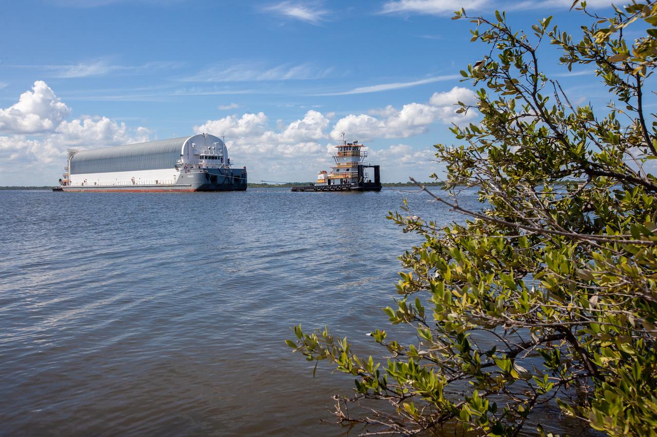 NASA's Pegasus Barge makes its way along the intercoastal waterway to its destination at the Kennedy Space Center Launch Complex 39 turn basin wharf, to make its first delivery to Kennedy in support of the agency's Artemis missions. The upgraded 310-foot-long barge arrived Sept. 27, 2019, ferrying the 212-foot-long Space Launch System rocket core stage pathfinder. The pathfinder is a full-scale mock-up of the rocket's core stage. The pathfinder will be used by the Exploration Ground Systems Program and their contractor, Jacobs, to practice offloading, moving and stacking maneuvers, using important ground support equipment to train employees and certify all the equipment works properly. The pathfinder will stay at Kennedy for approximately one month before trekking back to NASA's Michoud Assembly Facility in Louisiana.