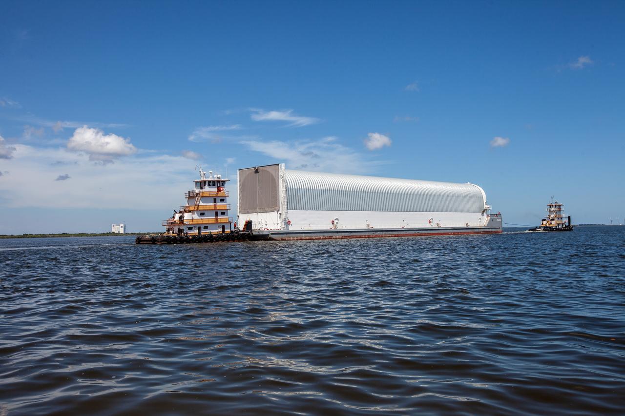 NASA's Pegasus Barge makes its way along the intercoastal waterway to its destination at the Kennedy Space Center Launch Complex 39 turn basin wharf, to make its first delivery to Kennedy in support of the agency's Artemis missions. The upgraded 310-foot-long barge arrived Sept. 27, 2019, ferrying the 212-foot-long Space Launch System rocket core stage pathfinder. The pathfinder is a full-scale mock-up of the rocket's core stage. The pathfinder will be used by the Exploration Ground Systems Program and their contractor, Jacobs, to practice offloading, moving and stacking maneuvers, using important ground support equipment to train employees and certify all the equipment works properly. The pathfinder will stay at Kennedy for approximately one month before trekking back to NASA's Michoud Assembly Facility in Louisiana.