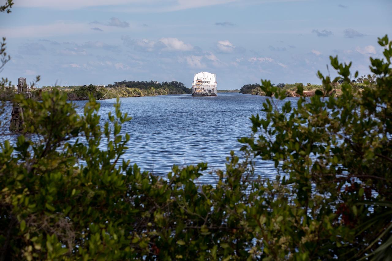 NASA's Pegasus Barge, which has a storied history of supporting the Space Shuttle Program, arrived at the Kennedy Space Center Launch Complex 39B turn basin wharf, carrying its first load in support of the agency's Artemis missions. The upgraded 310-foot-long barge arrived Friday, Sept. 27, ferrying the 212-foot-long Space Launch System (SLS) core stage pathfinder. Weighing in at 228,000 pounds, the pathfinder is a full-scale mockup of the rocket's core stage. The pathfinder will be utilized by the Exploration Ground Systems Program and their contractor, Jacobs, to practice offloading, moving and stacking maneuvers, utilizing important ground support equipment to train employees and certify all the equipment works properly. The pathfinder will stay at Kennedy for approximately one month before trekking back to NASA's Michoud Assembly Facility in Louisiana.