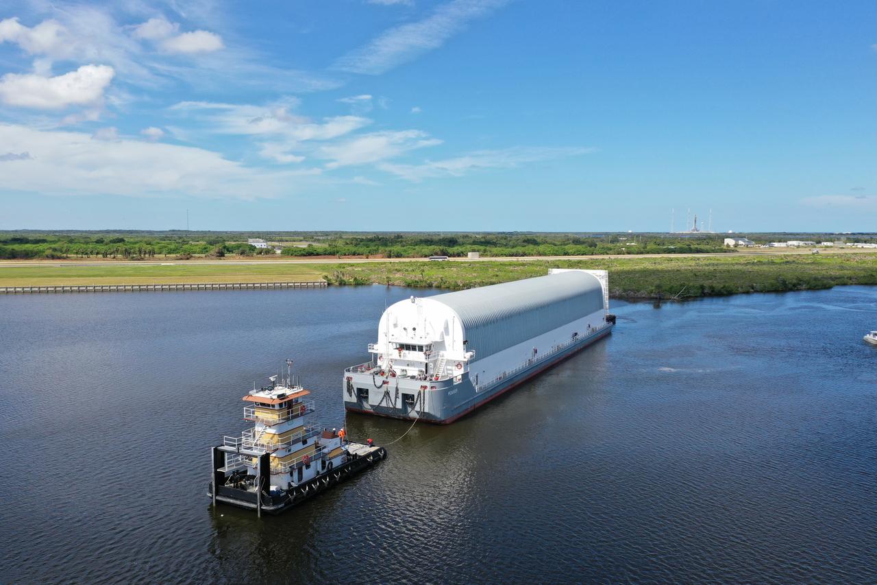 NASA's Pegasus Barge travels on the inland waterway to its destination at the Kennedy Space Center Launch Complex 39 turn basin wharf, to make its first delivery to Kennedy in support of the agency's Artemis missions. The upgraded 310-foot-long barge arrived Sept. 27, 2019, ferrying the 212-foot-long Space Launch System rocket core stage pathfinder. The pathfinder is a full-scale mock-up of the rocket's core stage. The pathfinder will be used by the Exploration Ground Systems Program and their contractor, Jacobs, to practice offloading, moving and stacking maneuvers, using important ground support equipment to train employees and certify all the equipment works properly. The pathfinder will stay at Kennedy for approximately one month before trekking back to NASA's Michoud Assembly Facility in Louisiana.