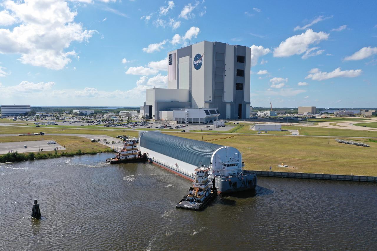 NASA's Pegasus Barge arrives at the Launch Complex 39 turn basin wharf at Kennedy Space Center in Florida to make its first delivery to Kennedy in support of the agency's Artemis missions. The upgraded 310-foot-long barge arrived Sept. 27, 2019, ferrying the 212-foot-long Space Launch System rocket core stage pathfinder. The pathfinder is a full-scale mock-up of the rocket's core stage. The pathfinder will be used by the Exploration Ground Systems Program and their contractor, Jacobs, to practice offloading, moving and stacking maneuvers, using important ground support equipment to train employees and certify all the equipment works properly. The pathfinder will stay at Kennedy for approximately one month before trekking back to NASA's Michoud Assembly Facility in Louisiana.