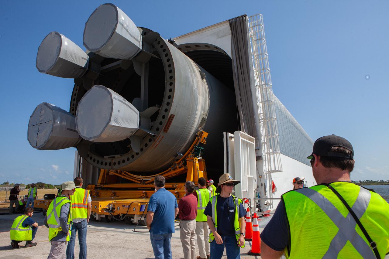 NASA and Jacobs technicians and engineers have begun offloading the 212-foot-long Space Launch System (SLS) rocket core stage pathfinder from NASA's Pegasus Barge at Kennedy Space Center’s Launch Complex 39 turn basin wharf on Sept. 30, 2019. The Pegasus Barge made its first delivery to Kennedy in support of the agency's Artemis missions. The upgraded 310-foot-long barge arrived Sept. 27, 2019, ferrying the SLS core stage pathfinder, a full-scale mock-up of the rocket's core stage. It will be used by the Exploration Ground Systems Program and their contractor, Jacobs, to practice offloading, moving and stacking maneuvers, using important ground support equipment to train employees and certify all the equipment works properly. The pathfinder will stay at Kennedy for approximately one month before trekking back to NASA's Michoud Assembly Facility in Louisiana.
