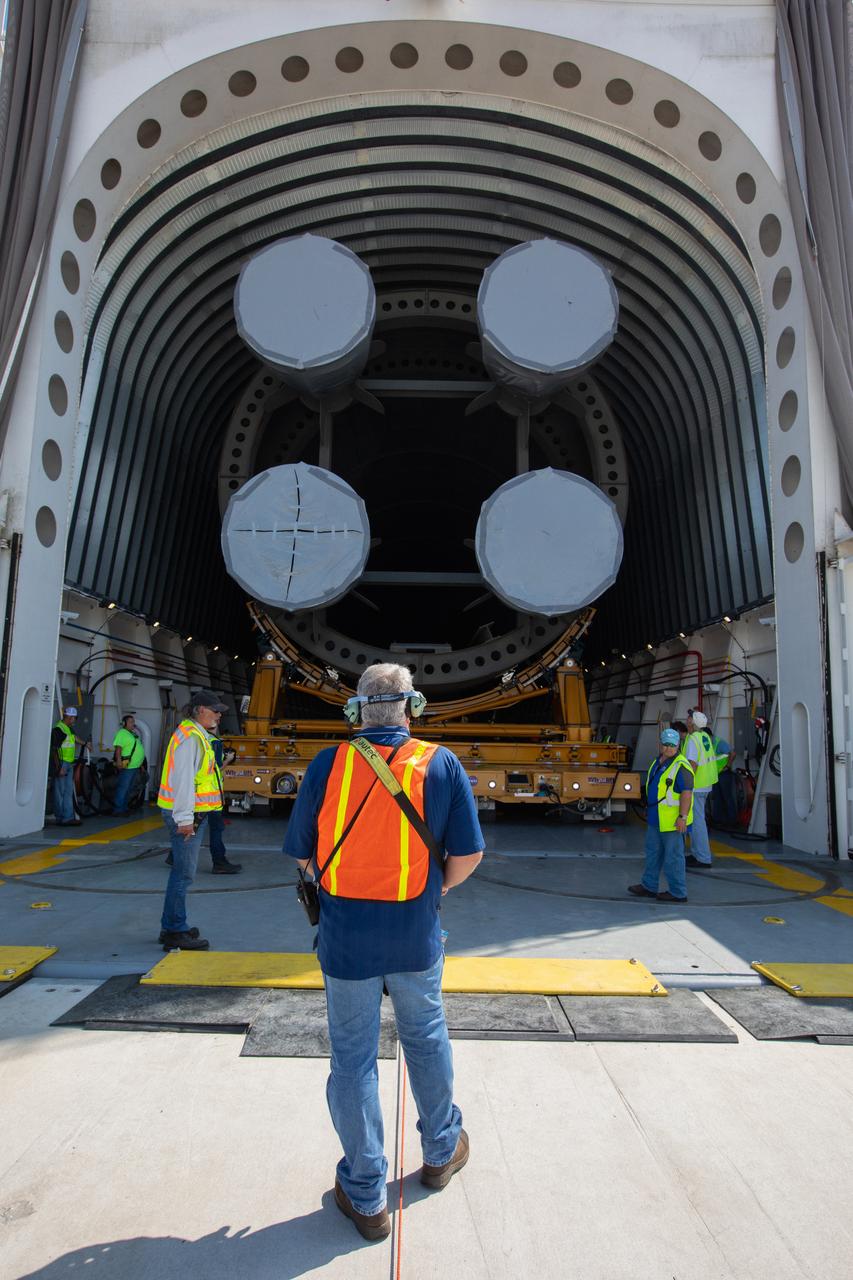 NASA and Jacobs technicians and engineers have begun offloading the 212-foot-long Space Launch System (SLS) rocket core stage pathfinder from NASA's Pegasus Barge at Kennedy Space Center’s Launch Complex 39 turn basin wharf on Sept. 30, 2019. The Pegasus Barge made its first delivery to Kennedy in support of the agency's Artemis missions. The upgraded 310-foot-long barge arrived Sept. 27, 2019, ferrying the SLS core stage pathfinder, a full-scale mock-up of the rocket's core stage. It will be used by the Exploration Ground Systems Program and their contractor, Jacobs, to practice offloading, moving and stacking maneuvers, using important ground support equipment to train employees and certify all the equipment works properly. The pathfinder will stay at Kennedy for approximately one month before trekking back to NASA's Michoud Assembly Facility in Louisiana.