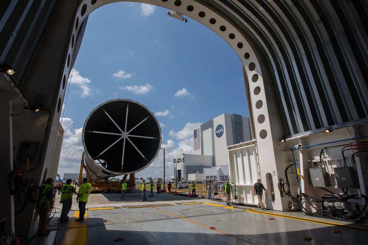 The 212-foot-long Space Launch System (SLS) rocket core stage pathfinder has been offloaded from NASA’s Pegasus Barge at Kennedy Space Center’s Launch Complex 39 turn basin wharf on Sept. 30, 2019. The Pegasus Barge made its first delivery to Kennedy in support of the agency's Artemis missions. The upgraded 310-foot-long barge arrived Sept. 27, 2019, ferrying the SLS core stage pathfinder, a full-scale mock-up of the rocket's core stage. It will be used by the Exploration Ground Systems Program and their contractor, Jacobs, to practice offloading, moving and stacking maneuvers, using important ground support equipment to train employees and certify all the equipment works properly. The pathfinder will stay at Kennedy for approximately one month before trekking back to NASA's Michoud Assembly Facility in Louisiana.
