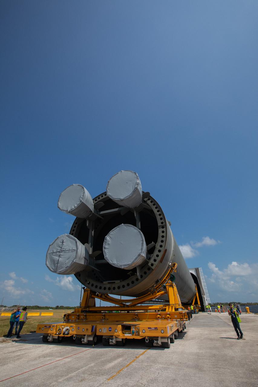 The 212-foot-long Space Launch System (SLS) rocket core stage pathfinder has been offloaded from NASA’s Pegasus Barge at Kennedy Space Center’s Launch Complex 39 turn basin wharf on Sept. 30, 2019. The Pegasus Barge made its first delivery to Kennedy in support of the agency's Artemis missions. The upgraded 310-foot-long barge arrived Sept. 27, 2019, ferrying the SLS core stage pathfinder, a full-scale mock-up of the rocket's core stage. It will be used by the Exploration Ground Systems Program and their contractor, Jacobs, to practice offloading, moving and stacking maneuvers, using important ground support equipment to train employees and certify all the equipment works properly. The pathfinder will stay at Kennedy for approximately one month before trekking back to NASA's Michoud Assembly Facility in Louisiana.