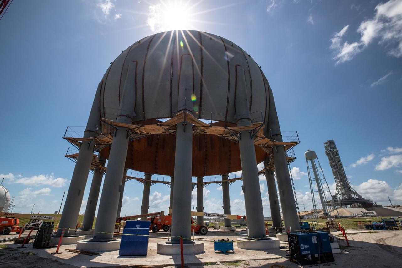 Build-up of a new liquid hydrogen (LH2) storage tank is in progress on Oct. 1, 2019, at Launch Complex 39B at NASA's Kennedy Space Center in Florida. The new tank will hold 1.25 million gallons of usable LH2 to support future launches from the pad, including Artemis missions to the Moon and on to Mars.