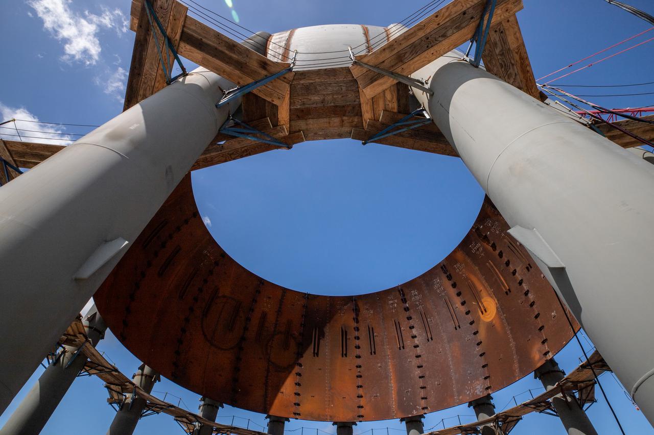 Build-up of a new liquid hydrogen (LH2) storage tank is in progress on Oct. 1, 2019, at Launch Complex 39B at NASA's Kennedy Space Center in Florida. The new tank will hold 1.25 million gallons of usable LH2 to support future launches from the pad, including Artemis missions to the Moon and on to Mars.