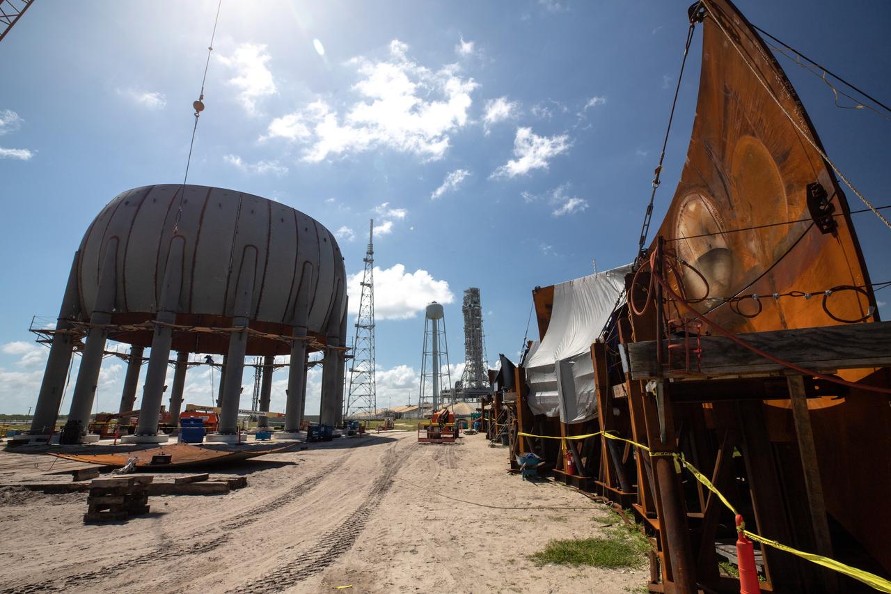 Build-up of a new liquid hydrogen (LH2) storage tank is in progress on Oct. 1, 2019, at Launch Complex 39B at NASA's Kennedy Space Center in Florida. The new tank will hold 1.25 million gallons of usable LH2 to support future launches from the pad, including Artemis missions to the Moon and on to Mars.