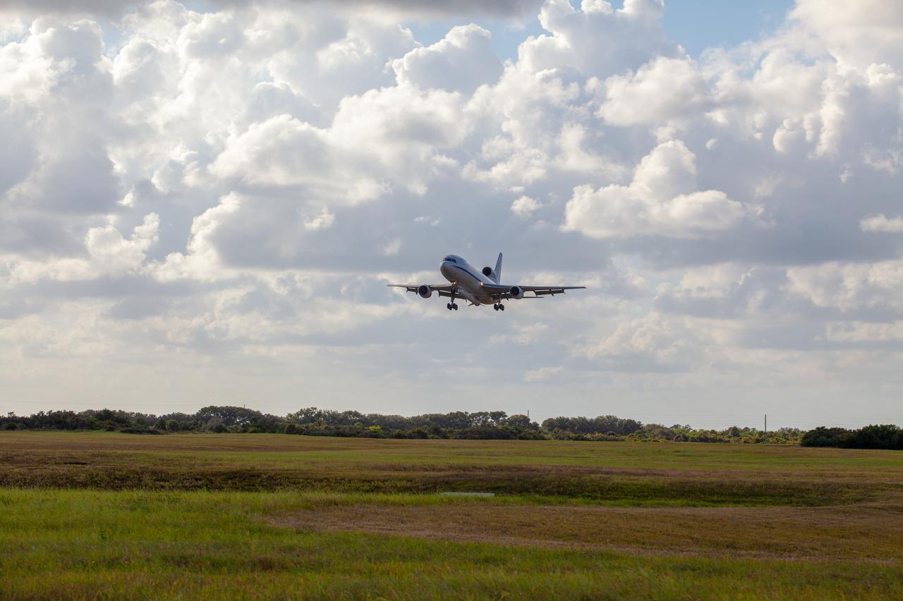 Northrop Grumman's L-1011 Stargazer aircraft descends toward the Skid Strip at Cape Canaveral Air Force Station in Florida on Oct. 1, 2019. The company's Pegasus XL rocket, containing NASA's Ionospheric Connection Explorer (ICON), is attached beneath the aircraft. ICON will study the frontier of space - the dynamic zone high in Earth's atmosphere where terrestrial weather from below meets space weather above.