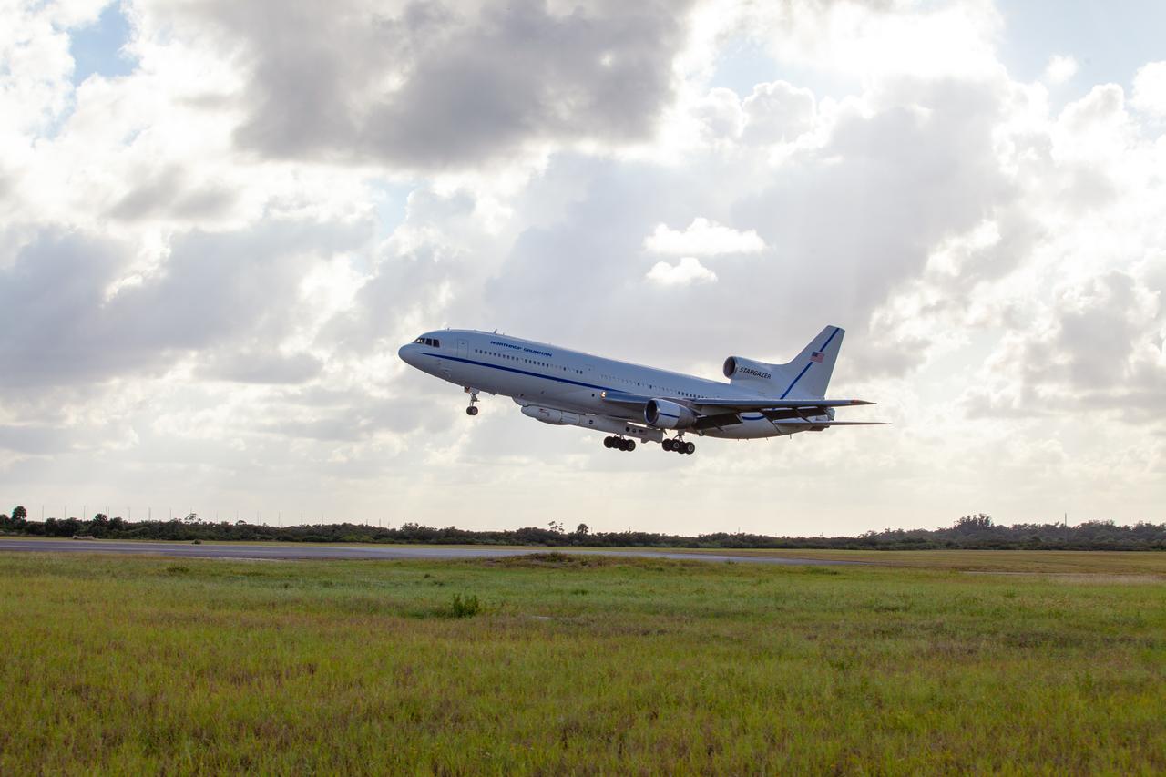 Northrop Grumman's L-1011 Stargazer aircraft descends toward the Skid Strip at Cape Canaveral Air Force Station in Florida on Oct. 1, 2019. The company's Pegasus XL rocket, containing NASA's Ionospheric Connection Explorer (ICON), is attached beneath the aircraft. ICON will study the frontier of space - the dynamic zone high in Earth's atmosphere where terrestrial weather from below meets space weather above.