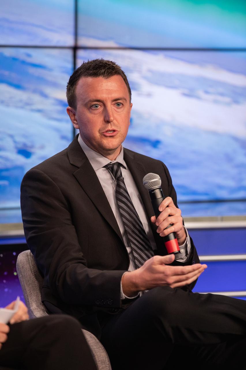 Will Ulrich, launch weather officer with the U.S. Air Force 45th Space Wing, speaks to news media during a prelaunch mission briefing for NASA’s Ionospheric Connection Explorer (ICON), on Oct. 8, 2019, in the News Center auditorium at the agency’s Kennedy Space Center in Florida. ICON is targeted to launch from Cape Canaveral Air Force Station in Florida on Oct. 9, 2019, aboard a Northrop Grumman Pegasus XL rocket carried aloft by the company’s Stargazer L-1011 aircraft. The explorer will study the frontier of space - the dynamic zone high in Earth's atmosphere where terrestrial weather from below meets space weather above.