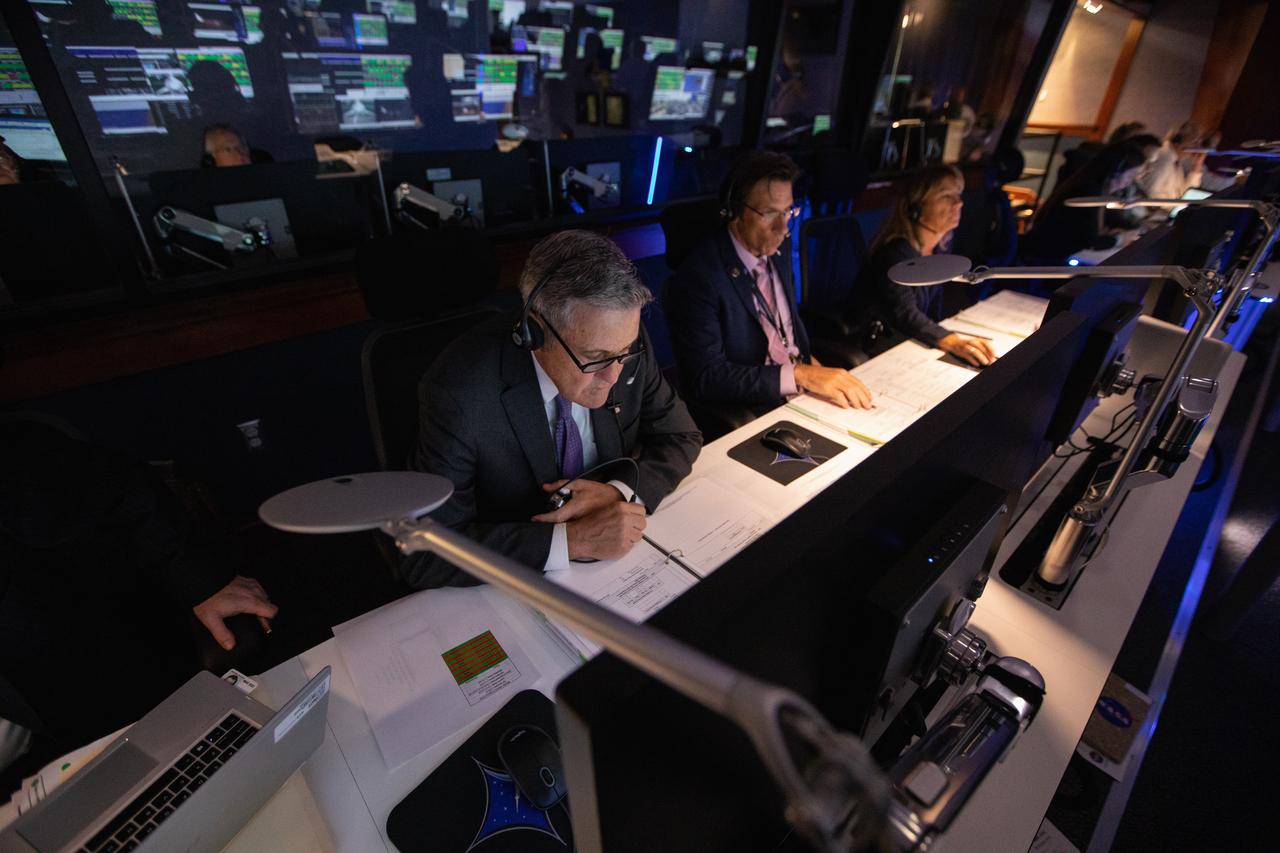 From left, Kennedy Space Center Director Bob Cabana, NASA’s Launch Services Program (LSP) Deputy Program Manager Chuck Dovale and LSP Program Manager Amanda Mitskevich monitor the launch of the agency’s Ionospheric Connection Explorer (ICON) satellite inside Hangar AE’s Mission Director’s Center at Cape Canaveral Air Force Station (CCAFS). The Northrop Grumman Pegasus XL rocket carrying ICON was released from the company’s L-1011 Stargazer aircraft at 9:59 p.m. EDT on Oct. 10, 2019, over the Atlantic Ocean about 50 miles from Daytona Beach, Florida, following takeoff from CCAFS. ICON will spend two years studying the Earth’s ionosphere – the dynamic zone in our atmosphere where terrestrial weather from below meets space weather from above. The ICON launch was managed by LSP. 