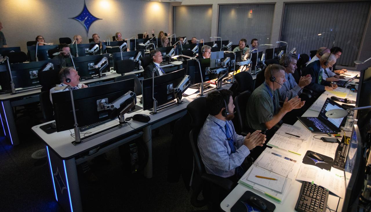 Inside Hangar AE at Cape Canaveral Air Force Station (CCAFS), members of the launch team applaud the successful launch of NASA’s Ionospheric Connection Explorer (ICON) satellite on Oct. 10, 2019. The Northrop Grumman Pegasus XL rocket carrying ICON was released from the company’s L-1011 Stargazer aircraft at 9:59 p.m. EDT over the Atlantic Ocean about 50 miles from Daytona Beach, Florida, following takeoff from CCAFS. ICON will spend two years studying the Earth’s ionosphere – the dynamic zone in our atmosphere where terrestrial weather from below meets space weather from above. The launch was managed by the agency’s Launch Services Program. 
