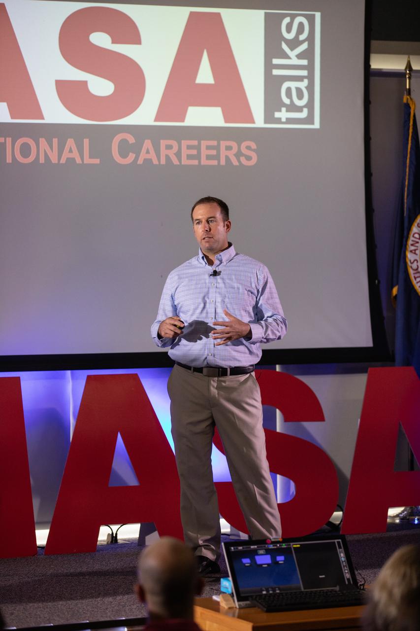Kennedy Space Center’s Dave Grau addresses co-workers inside the Florida spaceport’s Kennedy Learning Institute on Oct. 17, 2019, during the third in a series of five TED Talk-style informational sessions. Sponsored by Kennedy’s Launching Leaders and Leadership for the Future, NASAtalks focuses on the topic of intentional careers and aims to provide employees with tools and knowledge that can be utilized for career growth. The theme of this third session was customers, and additional speakers included Kennedy employees Ryan Richards and Mike Williams, with a skill-building section on active listening and negotiating by Tim Bass. 