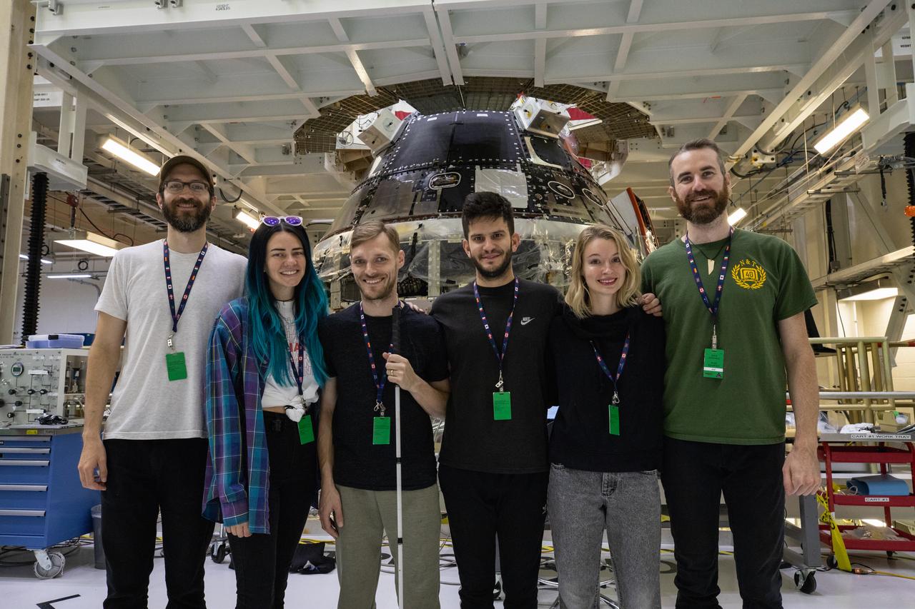 The rock band X Ambassadors is photographed in front of NASA’s Artemis I Orion spacecraft inside the Neil Armstrong Operations and Checkout (O&C) Building high bay at the agency’s Kennedy Space Center in Florida. X Ambassadors visited Kennedy on Oct. 21, 2019, and had the opportunity to tour areas around the multi-user spaceport such as the O&C, Launch Complex 39B and Swamp Works. The title of the band’s latest album, Orion, led them to an up-close look at the spacecraft that will take humans farther than they’ve ever gone before. 