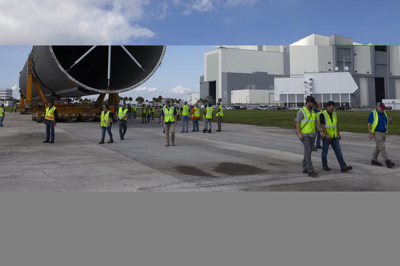 The 212-foot-long Space Launch System (SLS) rocket core stage pathfinder is being transported back to the Pegasus barge at the Launch Complex 39 turn basin wharf at NASA’s Kennedy Space Center in Florida on Oct. 28, 2019. The core stage pathfinder is a full-scale mock-up of the rocket's core stage. It was used by the Exploration Ground Systems Program and their contractor, Jacobs, to practice offloading, moving and stacking maneuvers inside the Vehicle Assembly Building, using important ground support equipment to train employees and certify all the equipment works properly. The pathfinder was at Kennedy for about a month. It will make the trek back to NASA's Michoud Assembly Facility in Louisiana.
