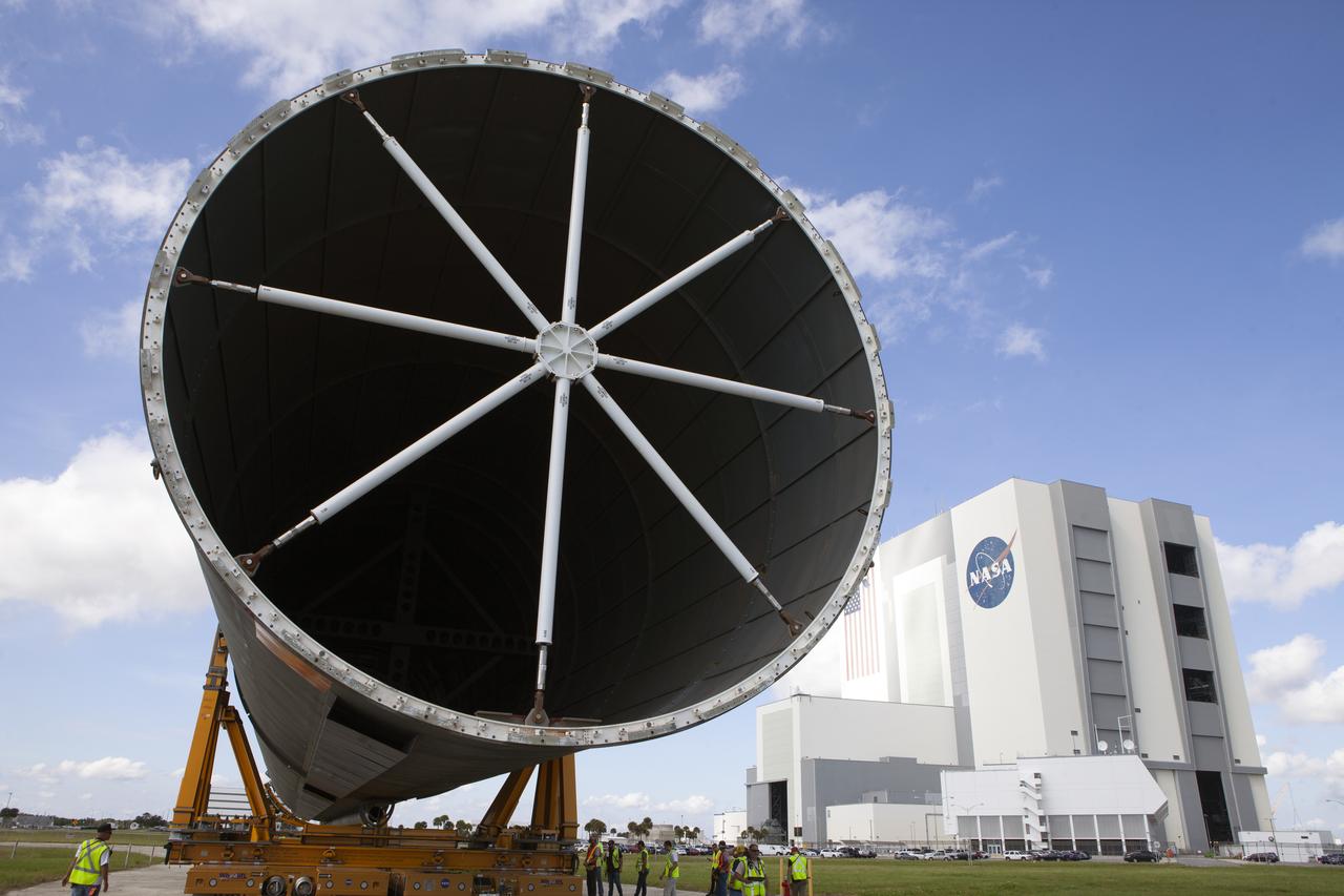A close-up view of the top of the 212-foot-long Space Launch System (SLS) rocket core stage pathfinder as it is being moved back to the Pegasus barge at the Launch Complex 39 turn basin wharf at NASA’s Kennedy Space Center in Florida on Oct. 28, 2019. The core stage pathfinder is a full-scale mock-up of the rocket's core stage. It was used by the Exploration Ground Systems Program and their contractor, Jacobs, to practice offloading, moving and stacking maneuvers inside the Vehicle Assembly Building, using important ground support equipment to train employees and certify all the equipment works properly. The pathfinder was at Kennedy for about a month. It will make the trek back to NASA's Michoud Assembly Facility in Louisiana.