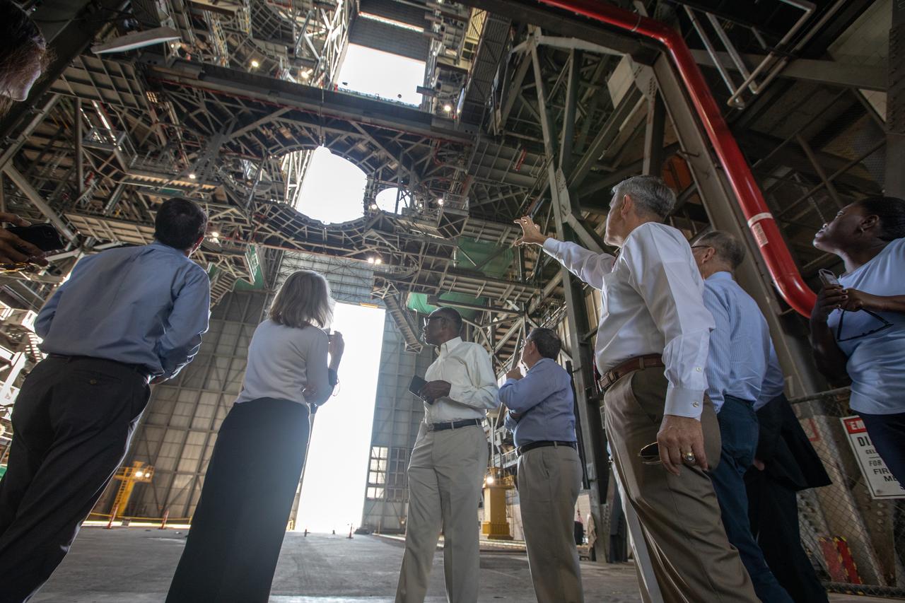 Kennedy Space Center Director Bob Cabana gestures toward work platforms while speaking to members of the NASA Advisory Council during a tour of the Vehicle Assembly Building on Oct. 30, 2019. The NASA Advisory Council provides the NASA administrator with counsel and advice on programs and issues of importance to the agency. Committee members conduct fact-finding sessions throughout the year in an effort to gain a broad understanding of current NASA issues and future mission implementation plans.