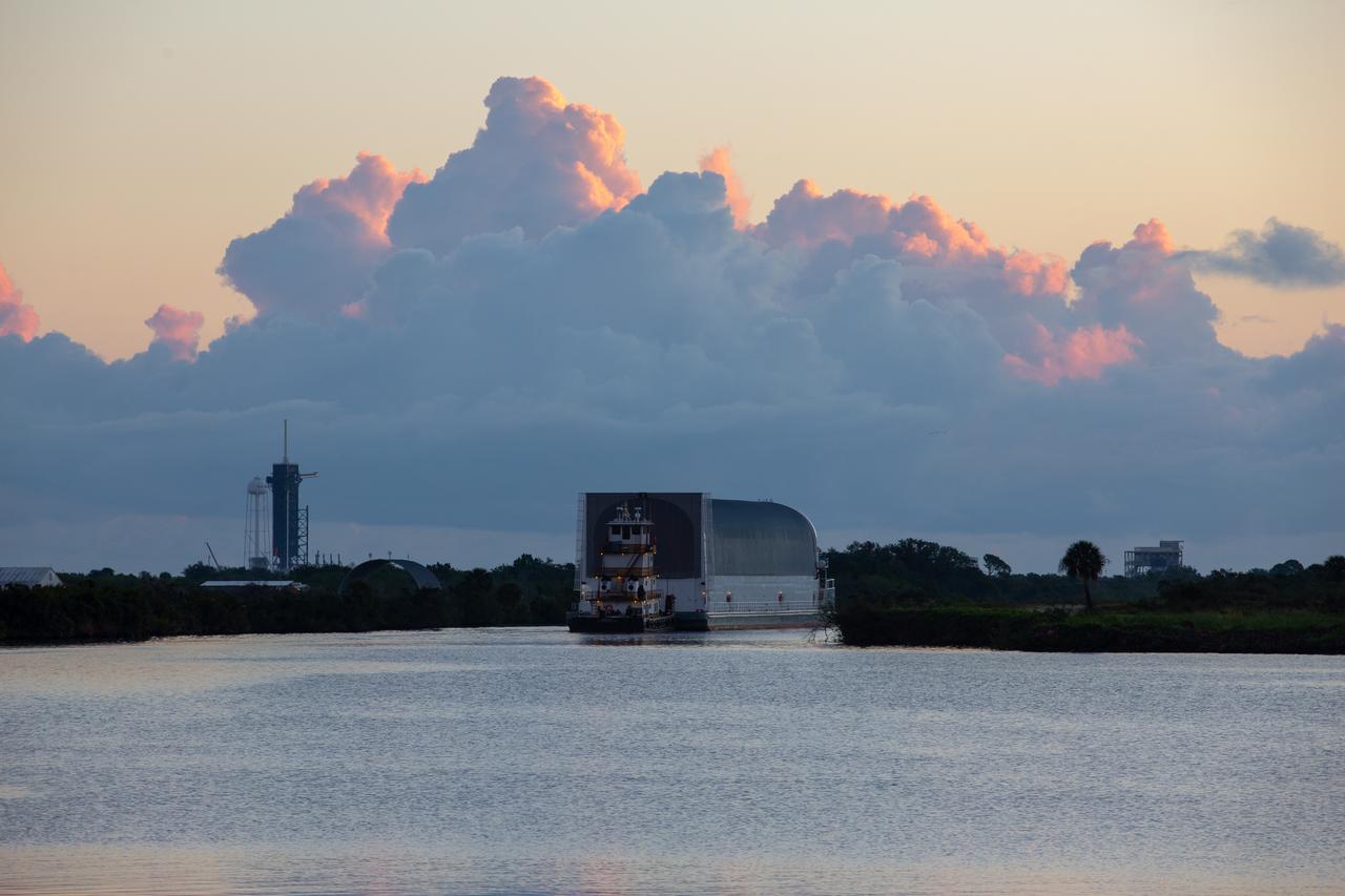 NASA’s Pegasus barge, with the 212-foot-long Space Launch System (SLS) rocket core stage pathfinder secured inside, departs the Launch Complex 39 turn basin wharf at NASA’s Kennedy Space Center in Florida on Oct. 31, 2019. The core stage pathfinder is a full-scale mock-up of the rocket's core stage. It was used by the Exploration Ground Systems Program and their contractor, Jacobs, to practice offloading, moving and stacking maneuvers inside the Vehicle Assembly Building, using important ground support equipment to train employees and certify all the equipment works properly. The pathfinder was at Kennedy for about a month. The barge with the pathfinder will make the trek back to NASA's Michoud Assembly Facility in Louisiana.