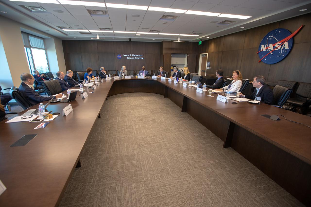 NASA Deputy Administrator Jim Morhard, sixth from right, and Kennedy Space Center Director Robert Cabana, fifth from right, participate in a NASA Advisory Council meeting at the center’s Central Campus Headquarters Building in Florida on Oct. 31, 2019. The NASA Advisory Council provides the NASA administrator with counsel and advice on programs and issues of importance to the agency. Committee members conduct fact-finding sessions throughout the year in an effort to gain a broad understanding of current NASA issues and future mission implementation plans.