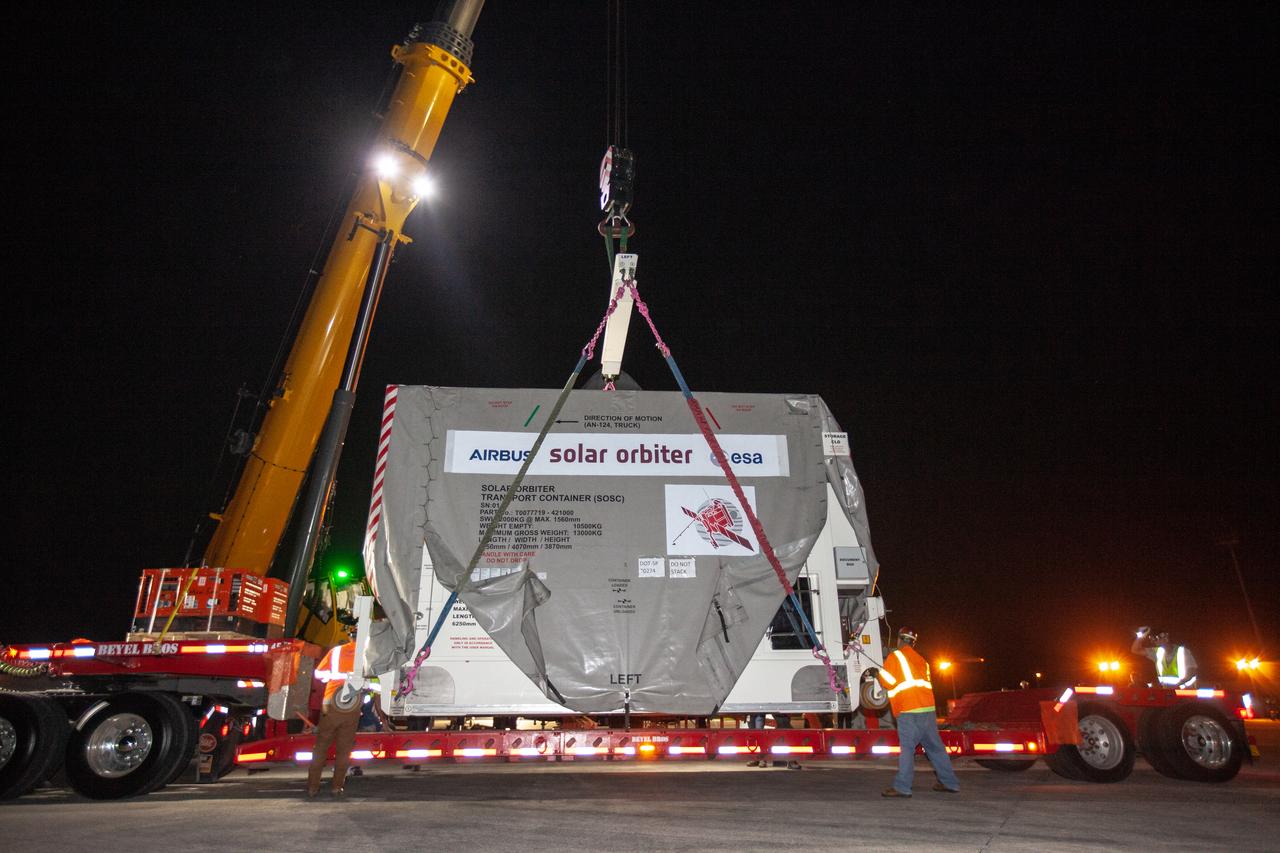 A crane carefully places the Solar Orbiter spacecraft on a truck for transportation from the Launch and Landing Facility at NASA’s Kennedy Space Center in Florida to the Astrotech Space Operations facility in nearby Titusville on Nov. 1, 2019. The spacecraft was delivered to the Florida spaceport aboard an Antonov An-124 cargo plane from Munich, Germany. Solar Orbiter is a European Space Agency mission with strong NASA participation. The mission aims to study the Sun, its outer atmosphere and solar winds. The spacecraft will provide the first images of the Sun’s poles. NASA’s Launch Services Program based at Kennedy is managing the launch. Liftoff is scheduled for Feb. 5, 2020, from Cape Canaveral Air Force Station aboard a United Launch Alliance Atlas V rocket. 